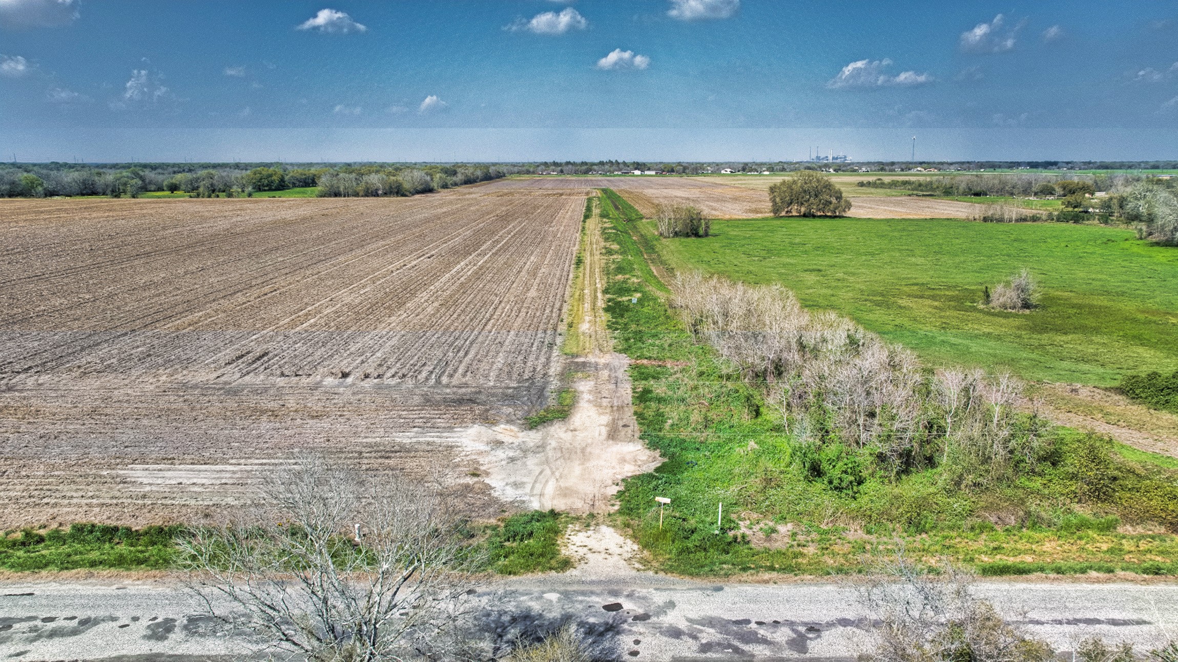 0 Davis Estate Road Needville, TX 77461 - Photo 7 of 22 a view of a dry yard with wooden fence