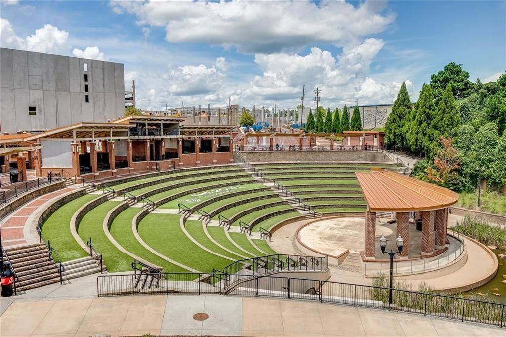 1276 Ainsworth Alley Sugar Hill, GA 30518 - Photo 39 of 56 a swimming pool with outdoor seating