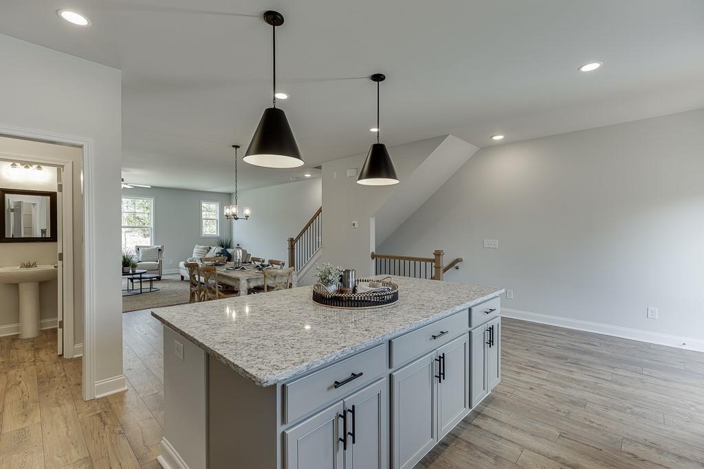 1276 Ainsworth Alley Sugar Hill, GA 30518 - Photo 7 of 56 a kitchen with sink and cabinets