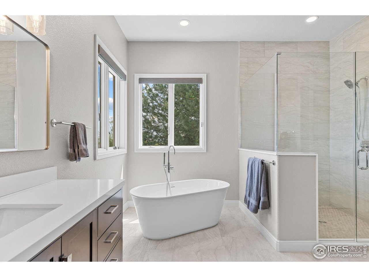 6557 Legend Ridge Trail Niwot, CO 80503 - Photo 19 of 42 Newly remodeled primary bath.