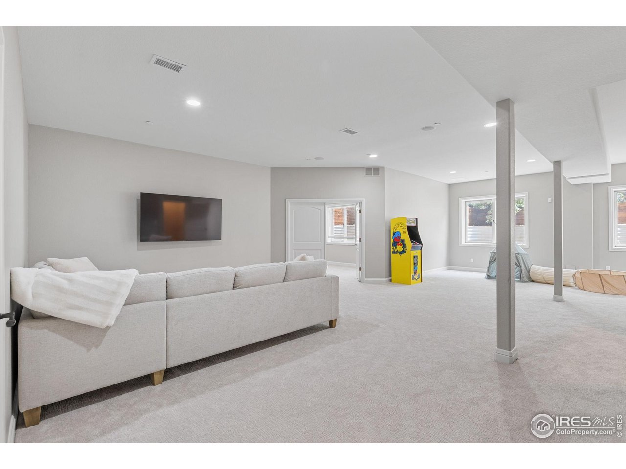 6557 Legend Ridge Trail Niwot, CO 80503 - Photo 34 of 42 Lower level living room