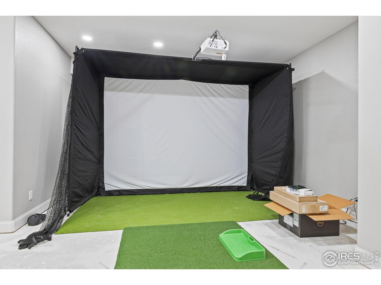 6557 Legend Ridge Trail Niwot, CO 80503 - Photo 35 of 42 Golf simulator.