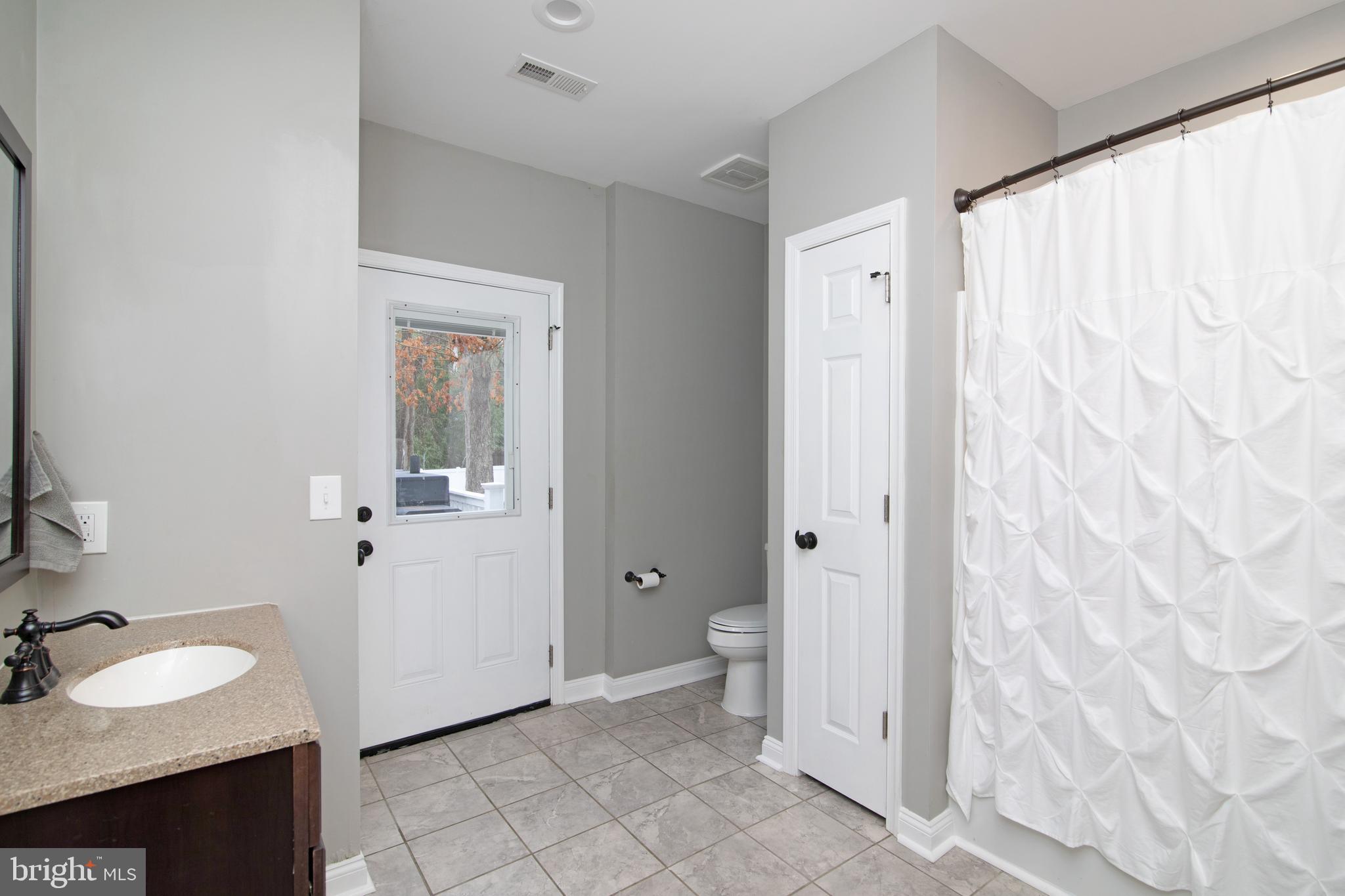 213 Dutch Row Road Elmer, NJ 08318 - Photo 8 of 41 Full bath with access to pool deck/back yard