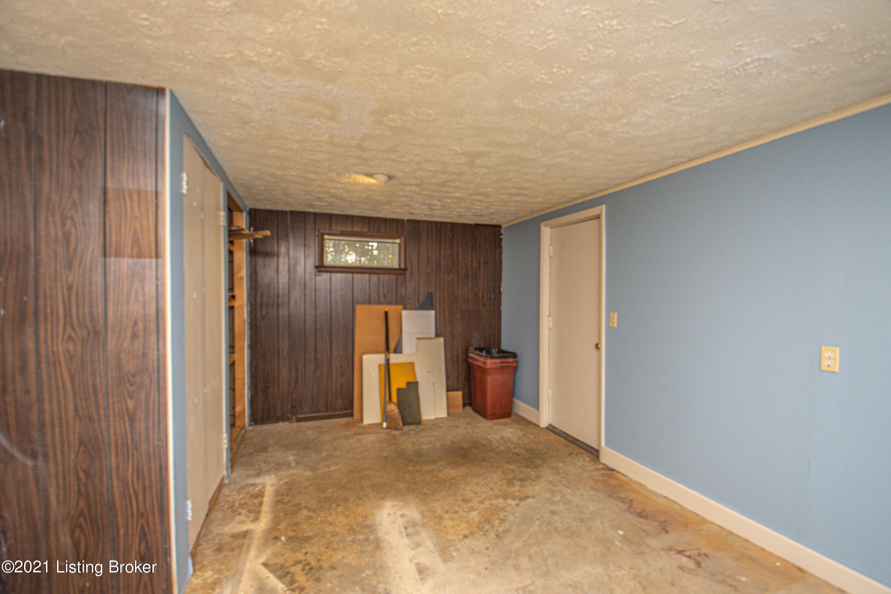 10610 St Rene Road Louisville, KY 40299 - Photo 24 of 34 027_LOWER LEVEL DOOR TO OUTSIDE