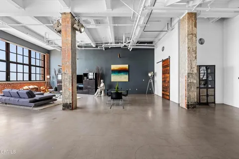 a view of livingroom with furniture and window