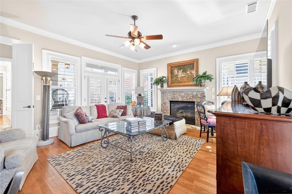 403 Tralee Court Statham, GA 30666 - Photo 49 of 98 a living room with furniture or couch and a fireplace