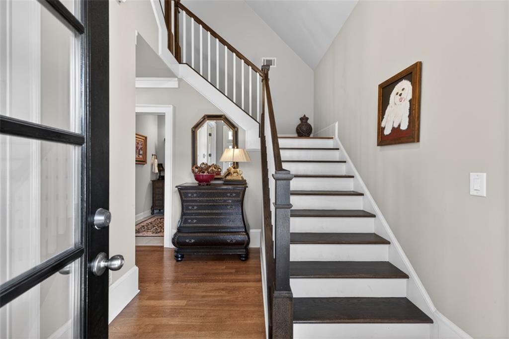 403 Tralee Court Statham, GA 30666 - Photo 8 of 98 a view of entryway and hall with wooden floor