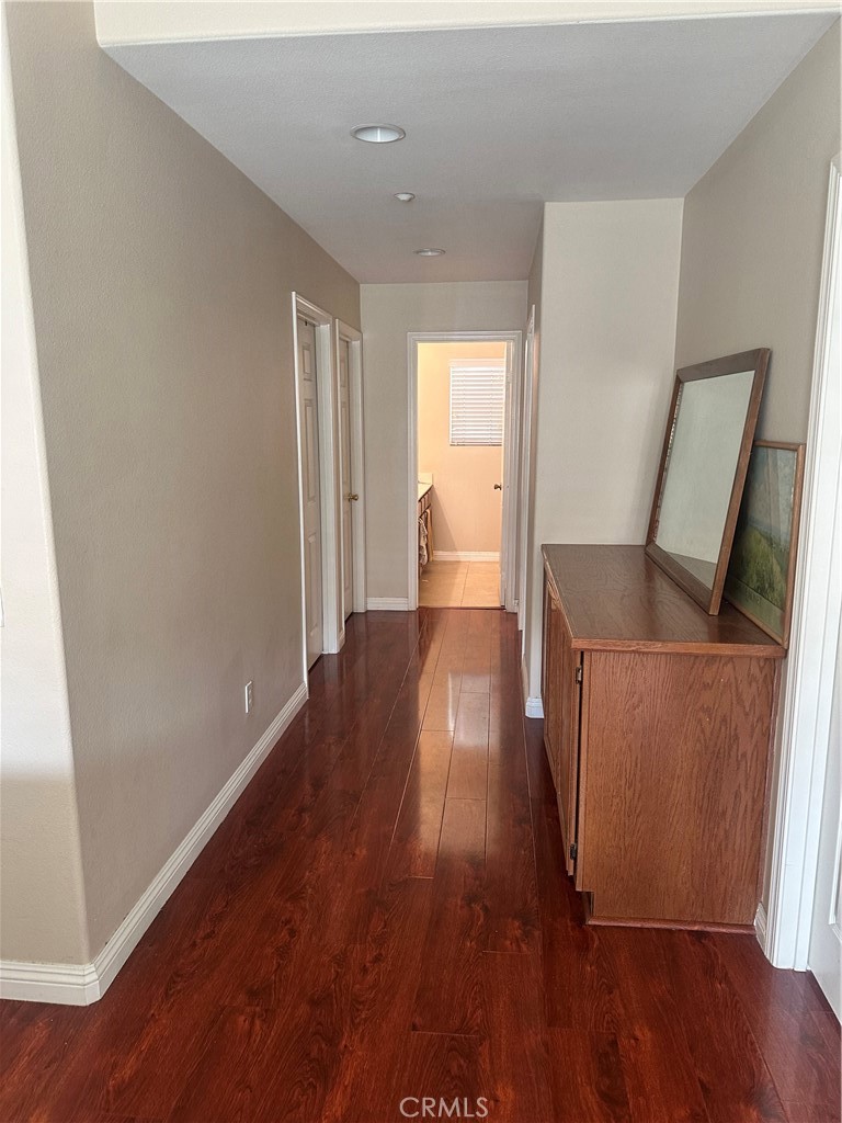 1646 Palermo Drive Riverside, CA 92507 - Photo 6 of 9 wooden floor in an empty room with a window