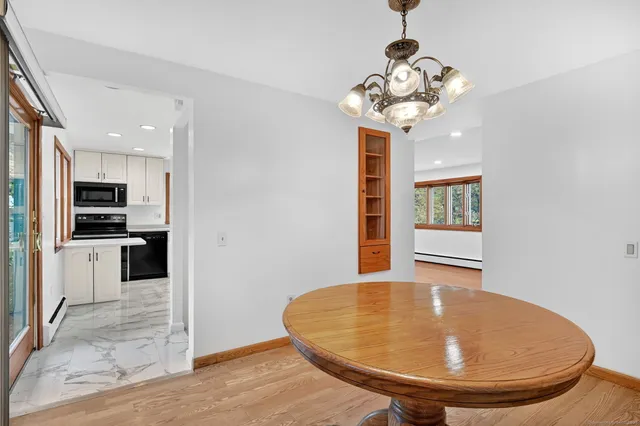 a view of a kitchen with a chandelier