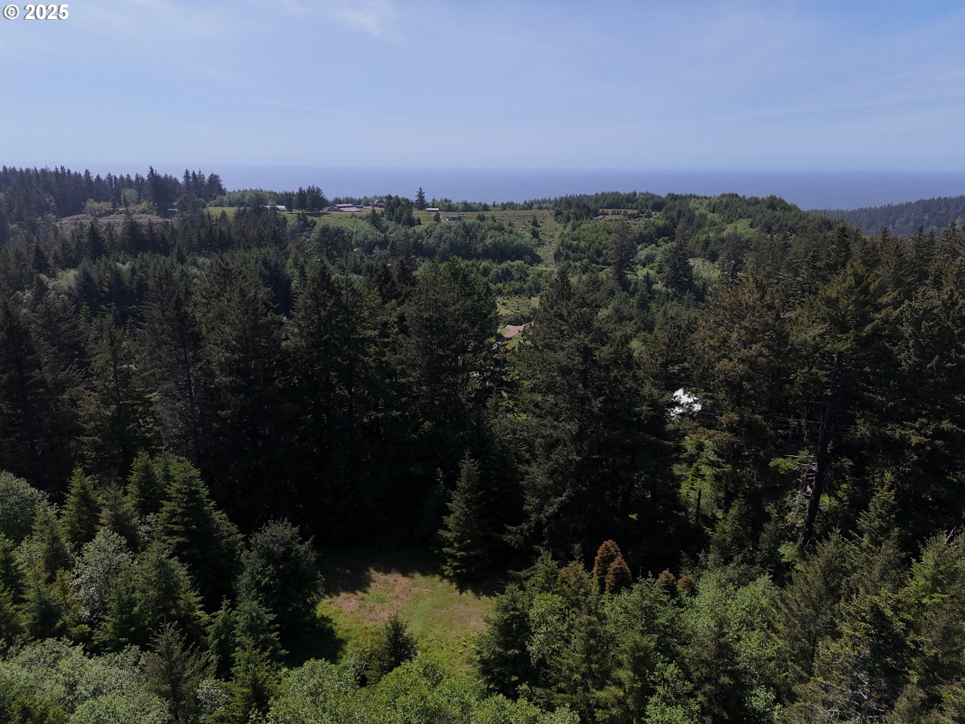 20452 Whaleshead Road Brookings, OR 97415 - Photo 24 of 40 a view of a city and mountains