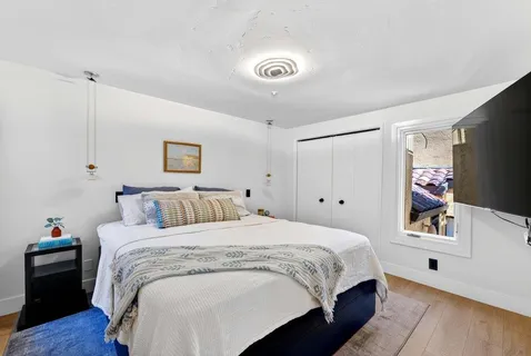 a bathroom with a sink a vanity and a mirror