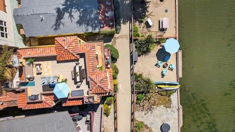 an outdoor space with patio furniture