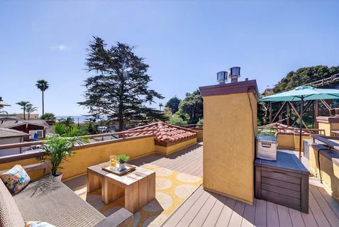 a view of a chairs and table on the wooden floor