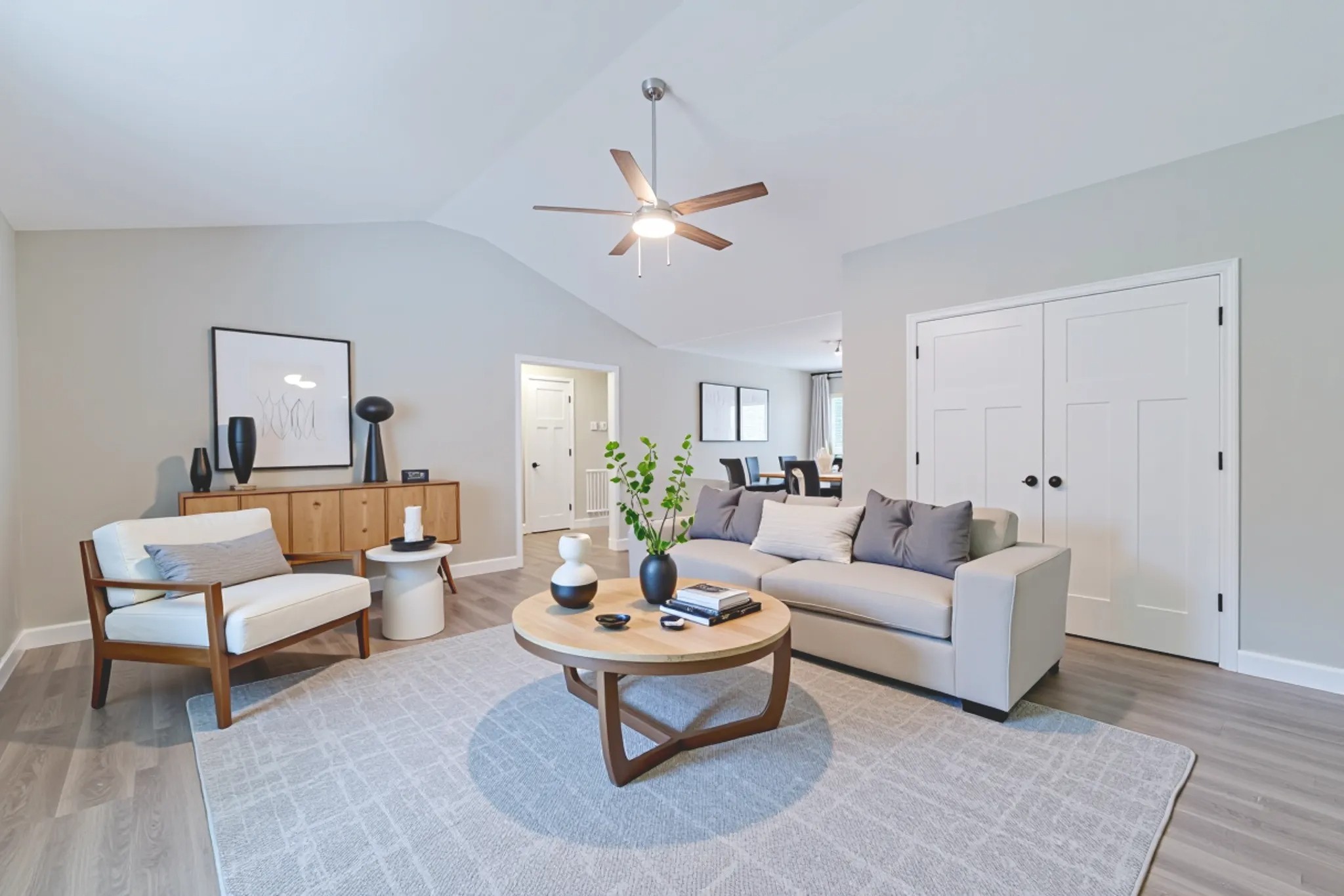 341 Wiseman Road Tullahoma, TN 37388 - Photo 3 of 21 a living room with furniture a rug and a chandelier