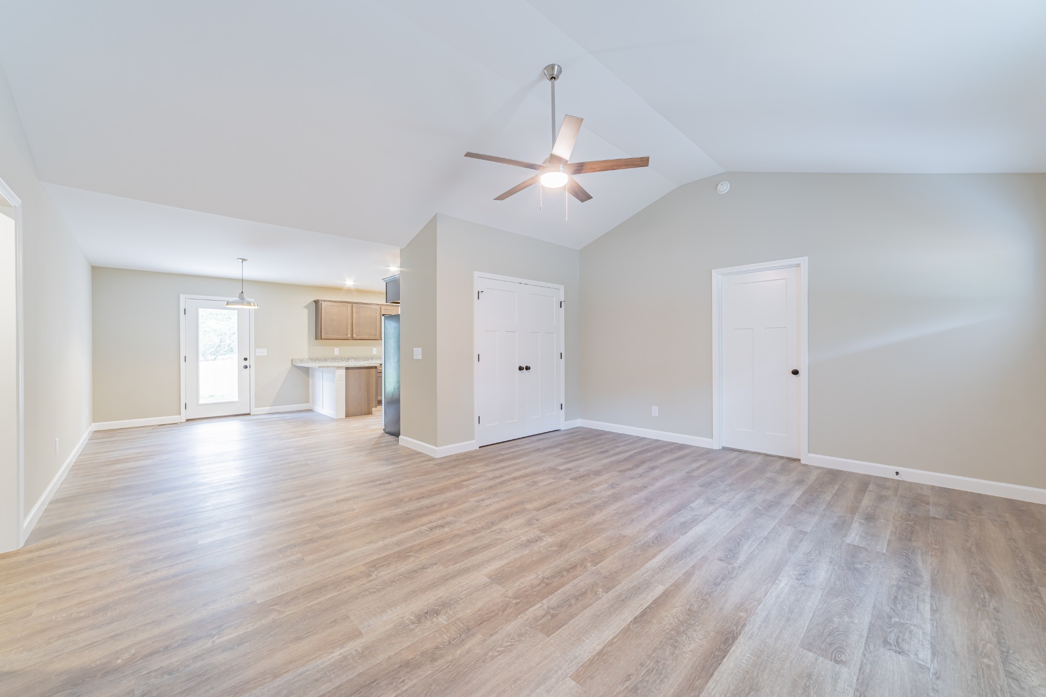 341 Wiseman Road Tullahoma, TN 37388 - Photo 4 of 21 a view of empty room with wooden floor and ceiling fan