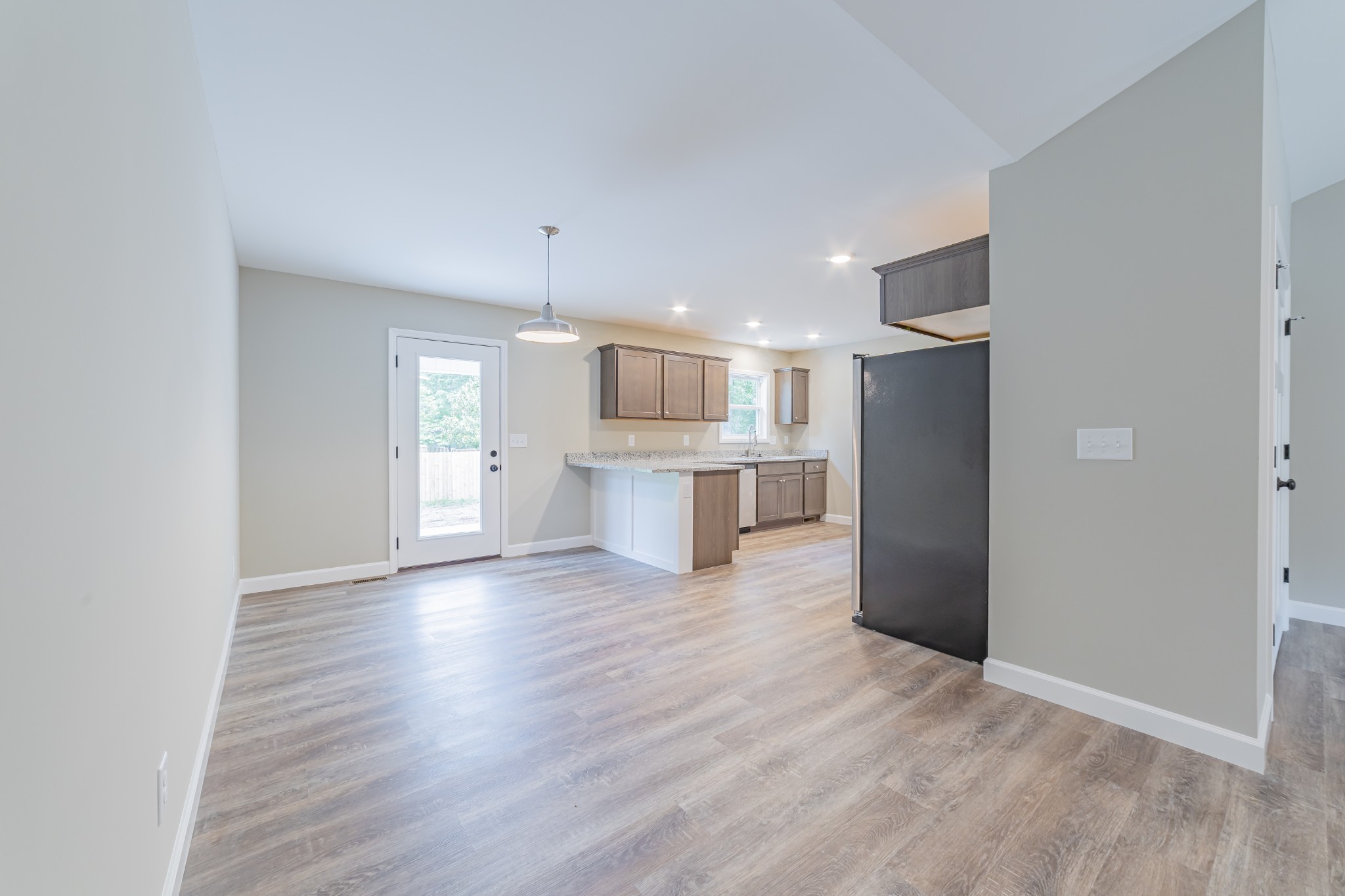 341 Wiseman Road Tullahoma, TN 37388 - Photo 5 of 21 a view of a kitchen with a sink and a refrigerator