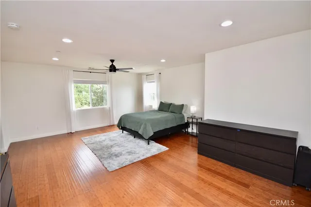 a living room with couch and a window
