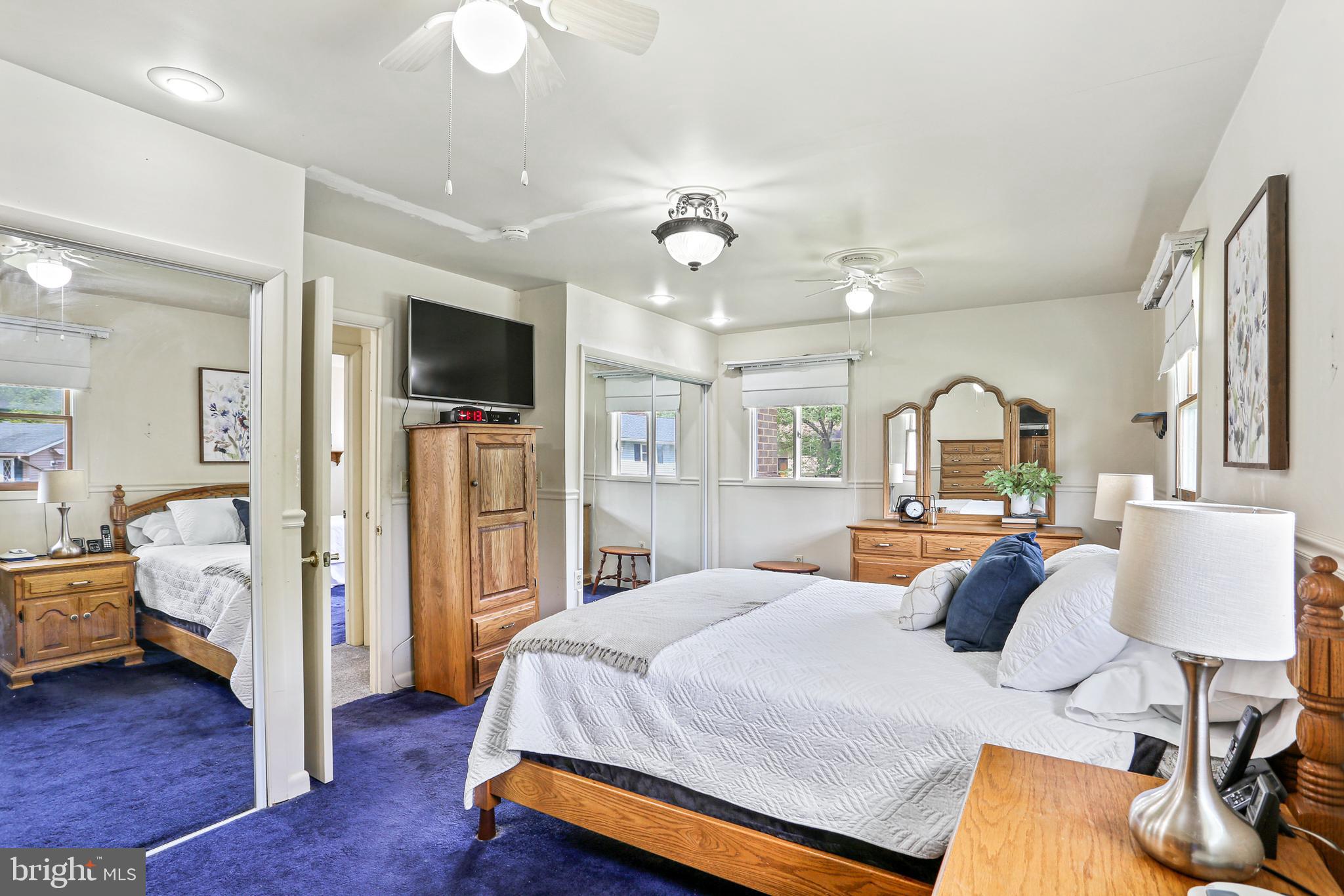3035 Tarpon Road Riva, MD 21140 - Photo 15 of 31 a bedroom with a bed and wooden floor