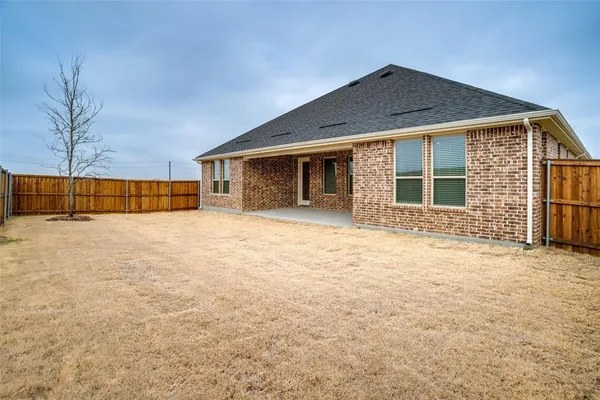a house with trees in front of it
