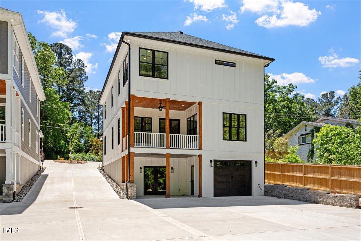 3934 Old Chapel Hill Road Durham, NC 27707 - Photo 2 of 47 a front view of a house with a garden