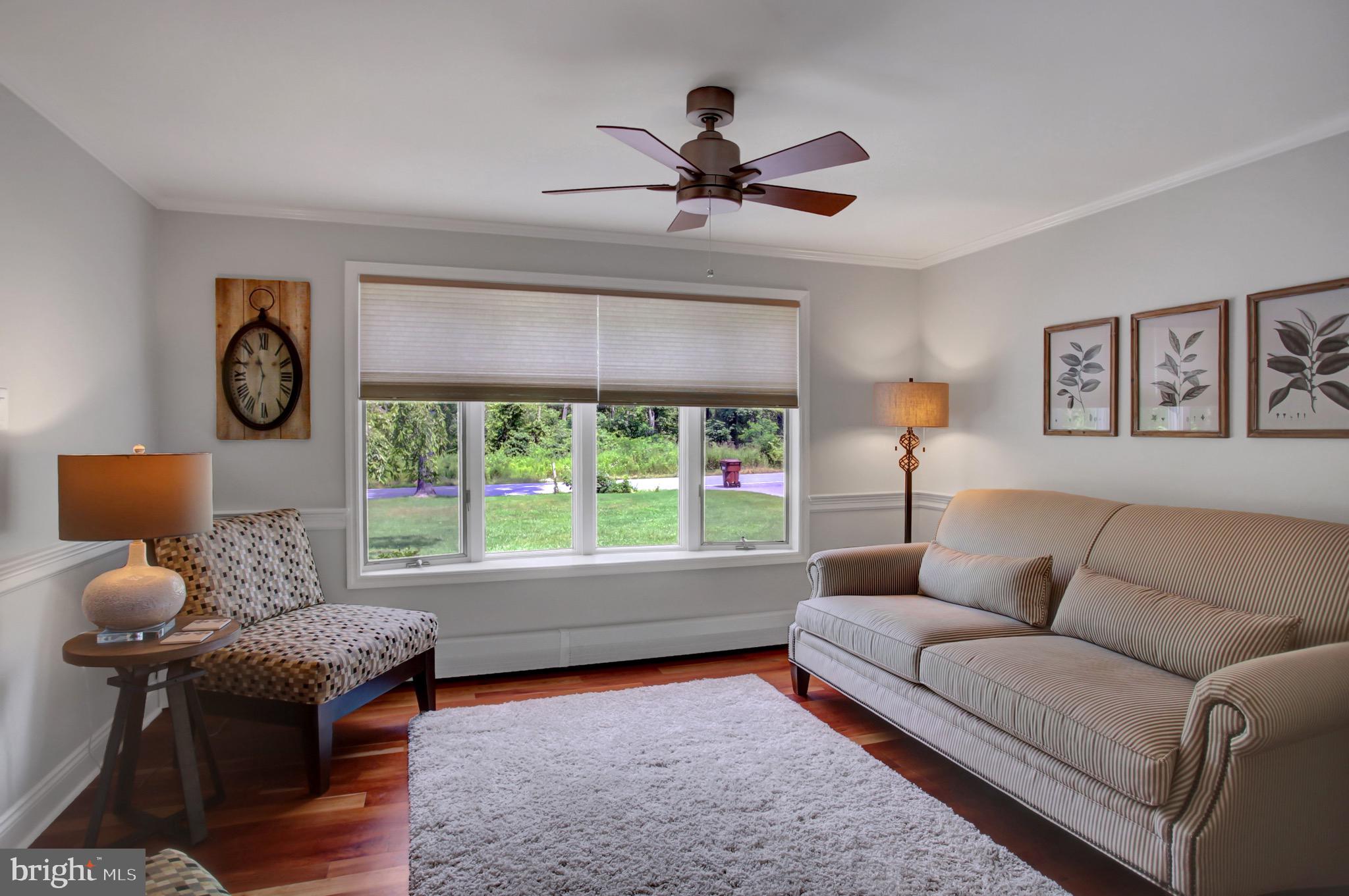 21796 Amberson Road Spring Run, PA 17262 - Photo 13 of 39 a living room with furniture and a large window