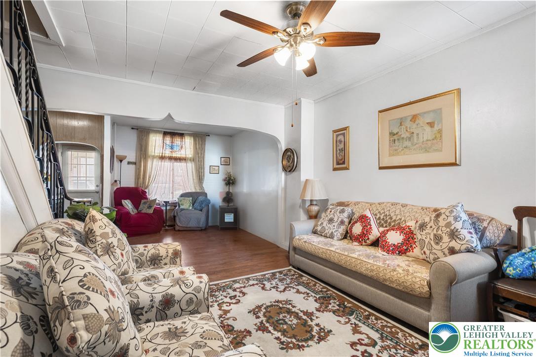535 North Front Street Allentown, PA 18102 - Photo 27 of 51 a living room with furniture ceiling fan and a rug