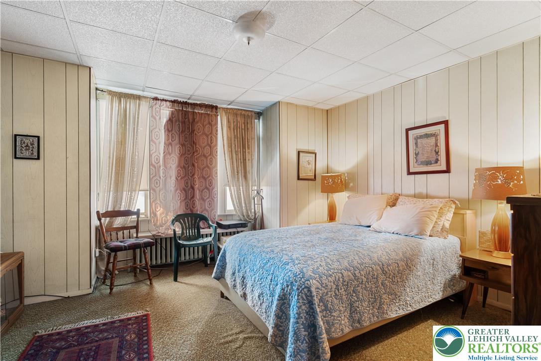 535 North Front Street Allentown, PA 18102 - Photo 37 of 51 a bedroom with a bed and a couch