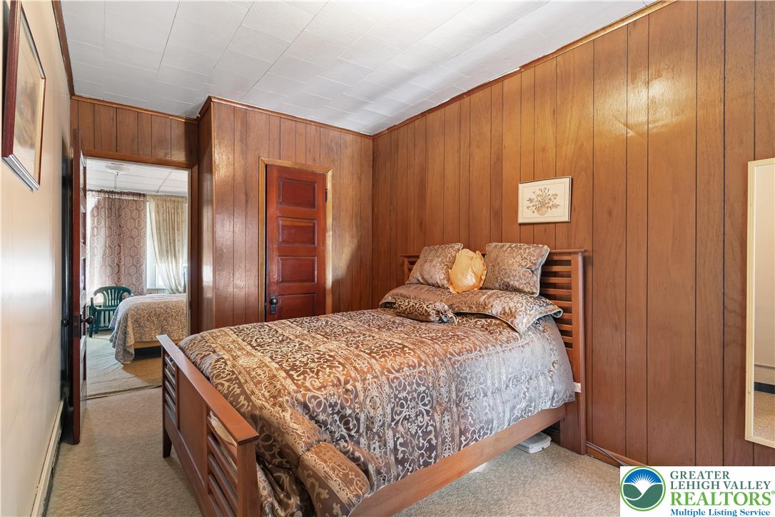 535 North Front Street Allentown, PA 18102 - Photo 41 of 51 a bedroom with a bed and a dresser