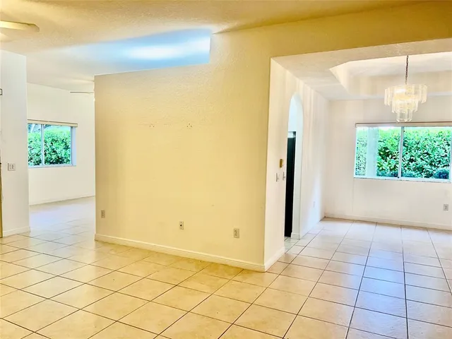 an empty room with white walls