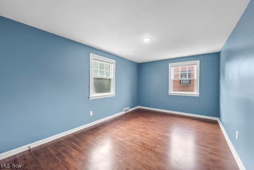 22790 Chardon Road Euclid, OH 44117 - Photo 7 of 35 Empty room with wood-type flooring