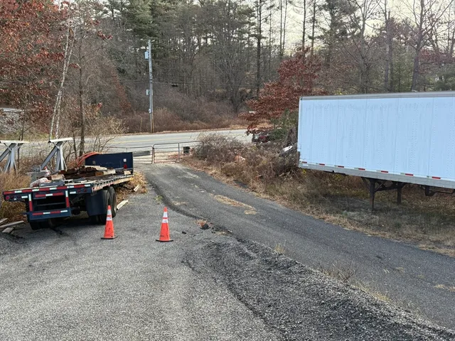 a view of car parked on the side of road