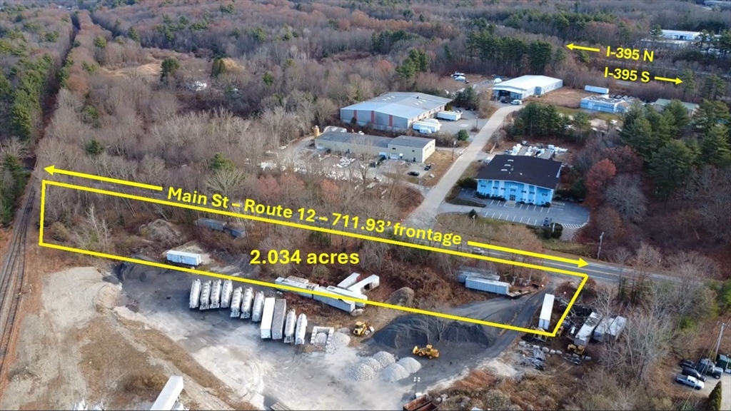 47 Main Street Oxford, MA 01540 - Photo 10 of 10 a street view with tall buildings