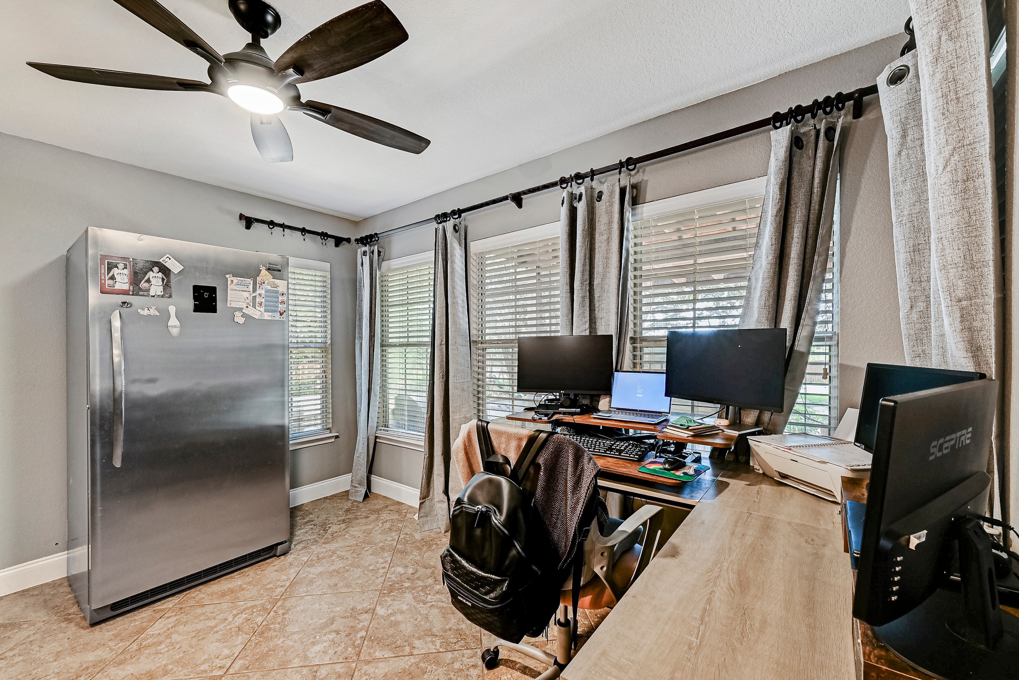 104 North Sumac Lane Georgetown, TX 78633 - Photo 18 of 40 A versatile bonus room offers ample space for both work and daily living.