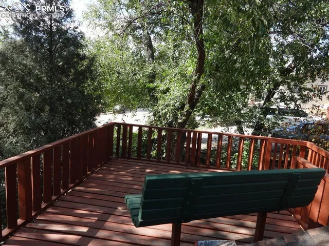 a view of balcony with furniture