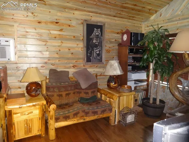 a view of a kitchen with furniture and windows