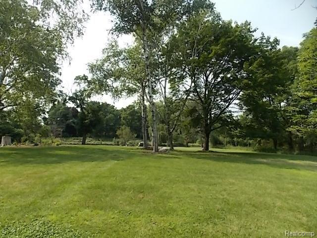 1431 Washington Road Rochester, MI 48306 - Photo 69 of 75 Sprawling Backyard