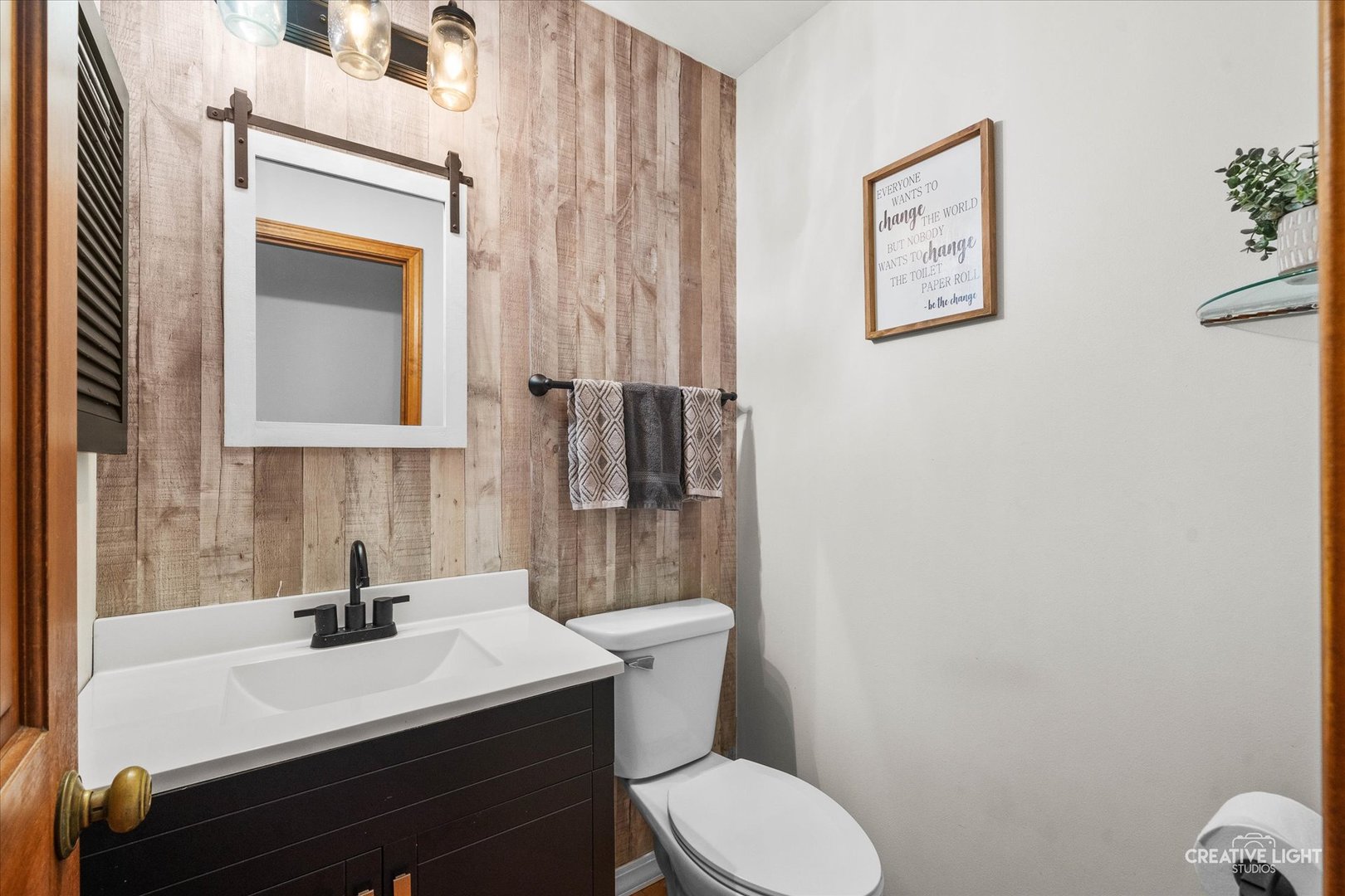 1348 Midway Avenue St. Charles, IL 60174 - Photo 11 of 23 a bathroom with a sink a toilet and shower curtain