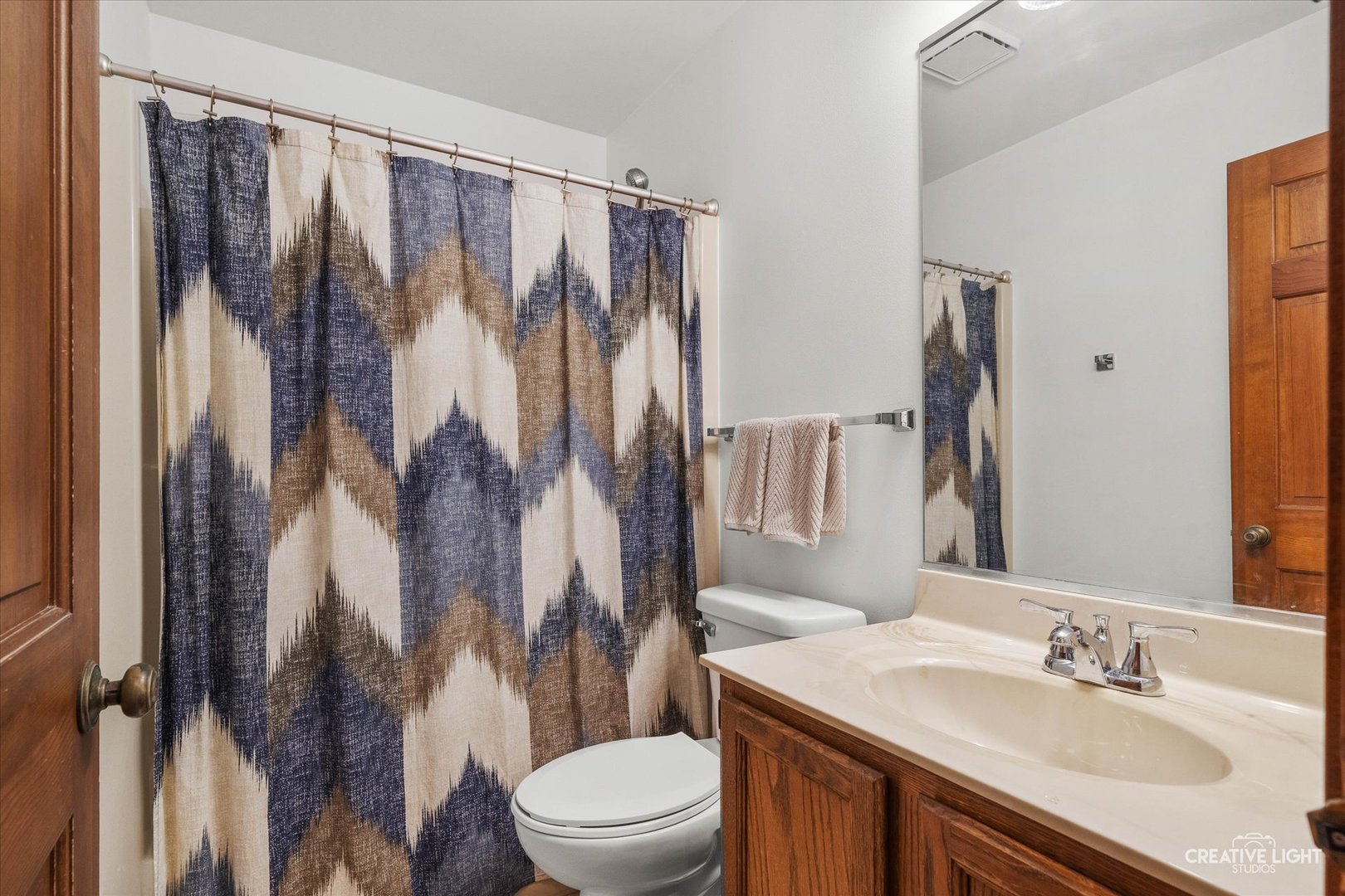 1348 Midway Avenue St. Charles, IL 60174 - Photo 16 of 23 a bathroom with a sink toilet and shower