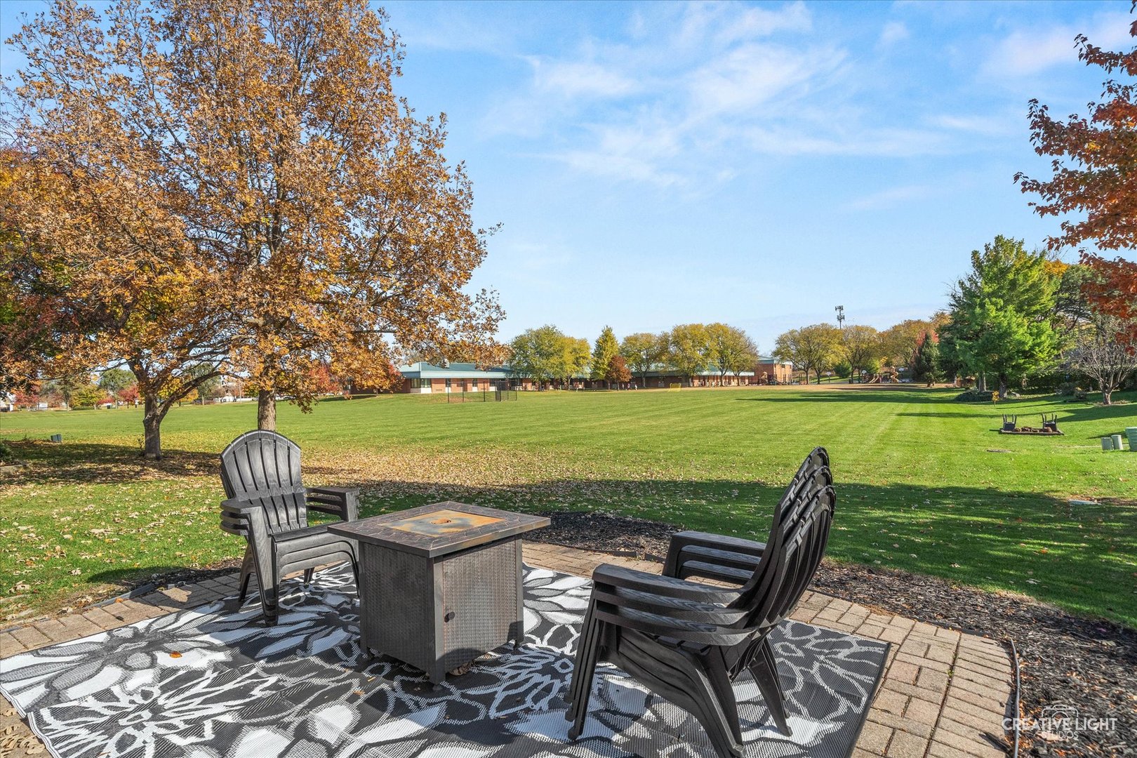 1348 Midway Avenue St. Charles, IL 60174 - Photo 23 of 23 a view of a lake with a garden and outdoor seating