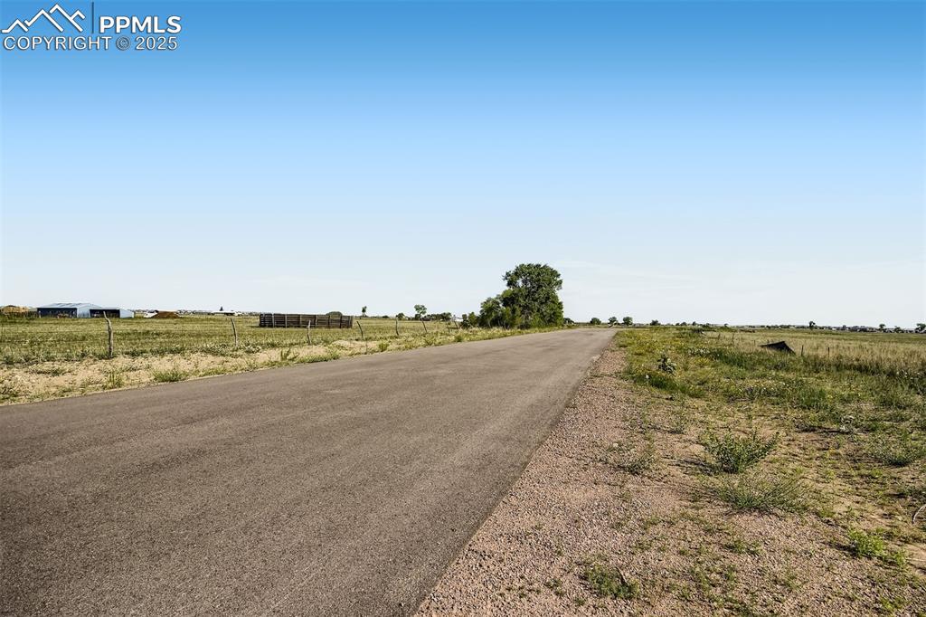 8625 Bailiff Drive Peyton, CO 80831 - Photo 3 of 11 paved road