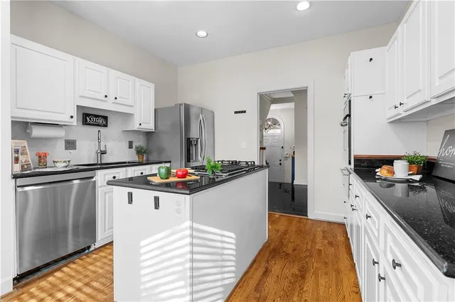 a view of a livingroom with a furniture and windows