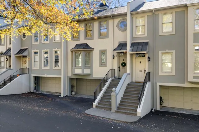 a picture of a bathroom with a shower