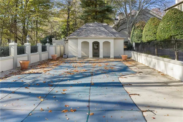 a view of a yard with large tree