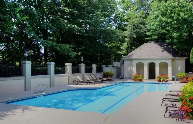a view of a park with swings and slides