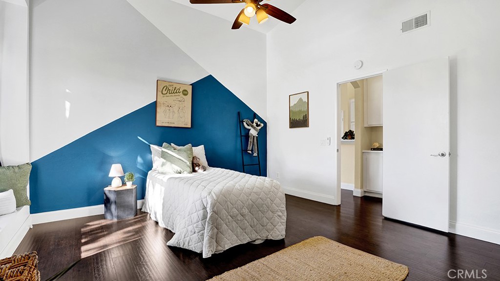 19431-57d Rue De Valore Lake Forest, CA 92610 - Photo 14 of 31 a bedroom with a bed and wooden floor