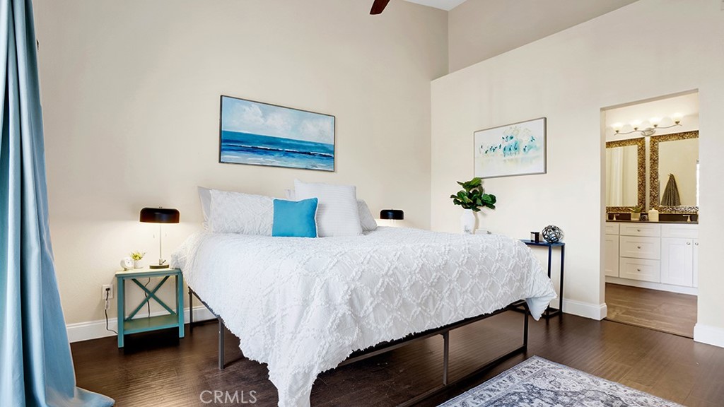 19431-57d Rue De Valore Lake Forest, CA 92610 - Photo 18 of 31 a bedroom with a bed a table and chair