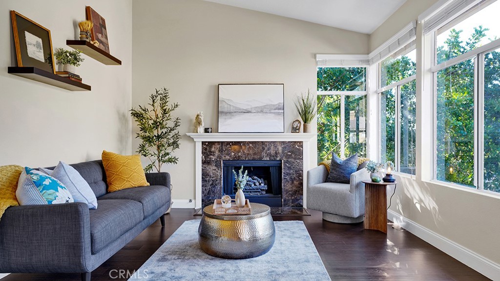 19431-57d Rue De Valore Lake Forest, CA 92610 - Photo 2 of 31 a living room with furniture and a fireplace