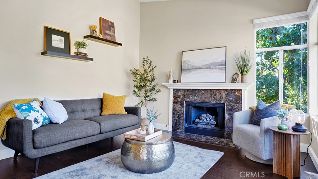 19431-57d Rue De Valore Lake Forest, CA 92610 - Photo 4 of 31 a living room with furniture and a fireplace