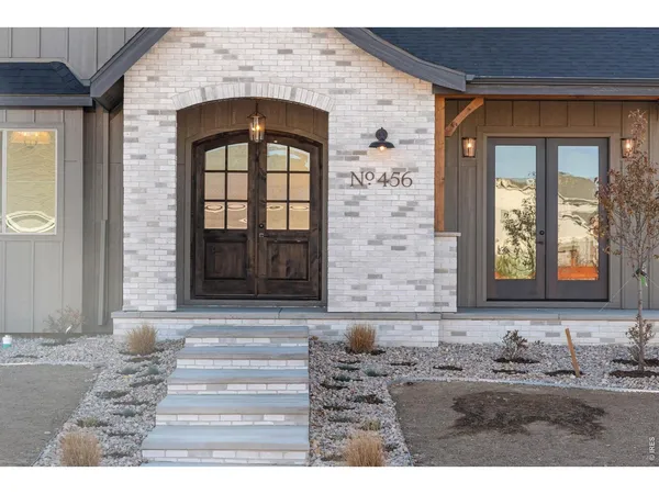 a front view of a house with a front door