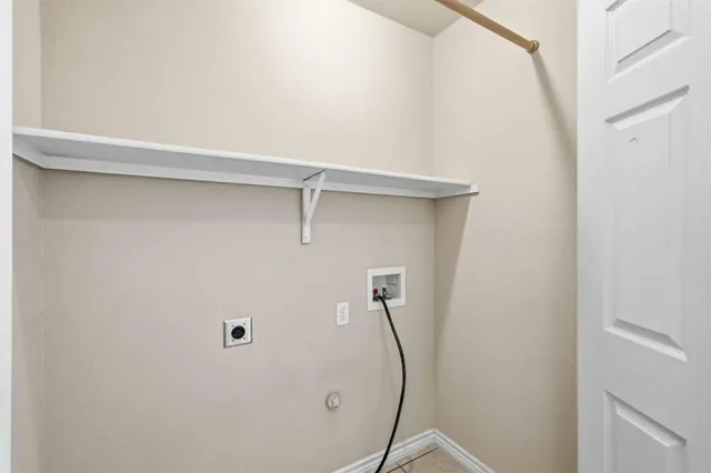 a view of small space with racks on the wall